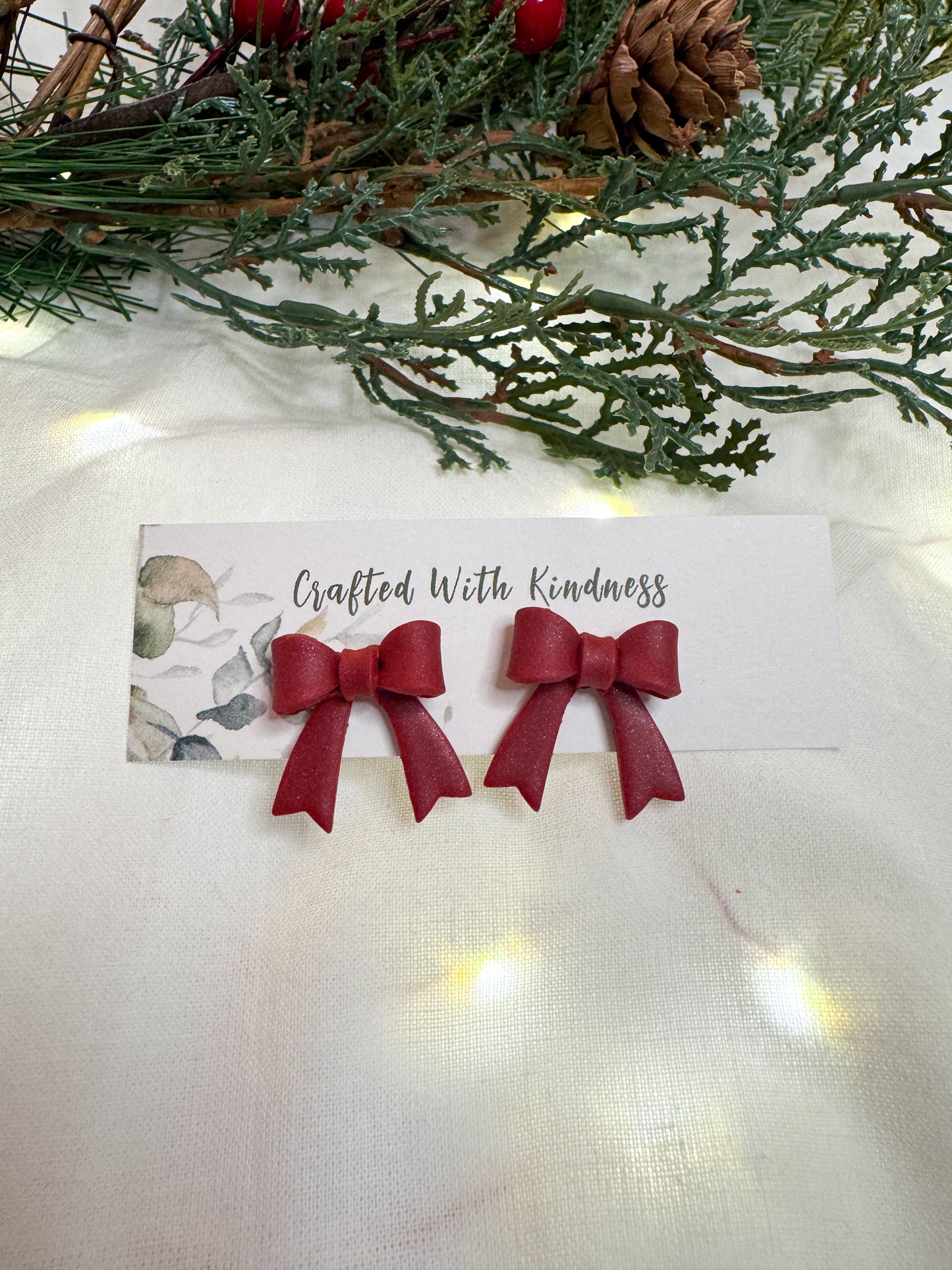 Cute red bow stud earrings. Great for Christmas. 